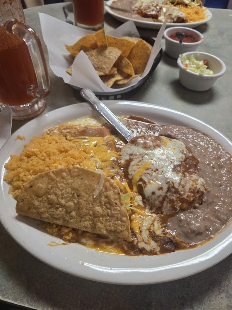 Mexican restaurant interior with warm, simple decor.