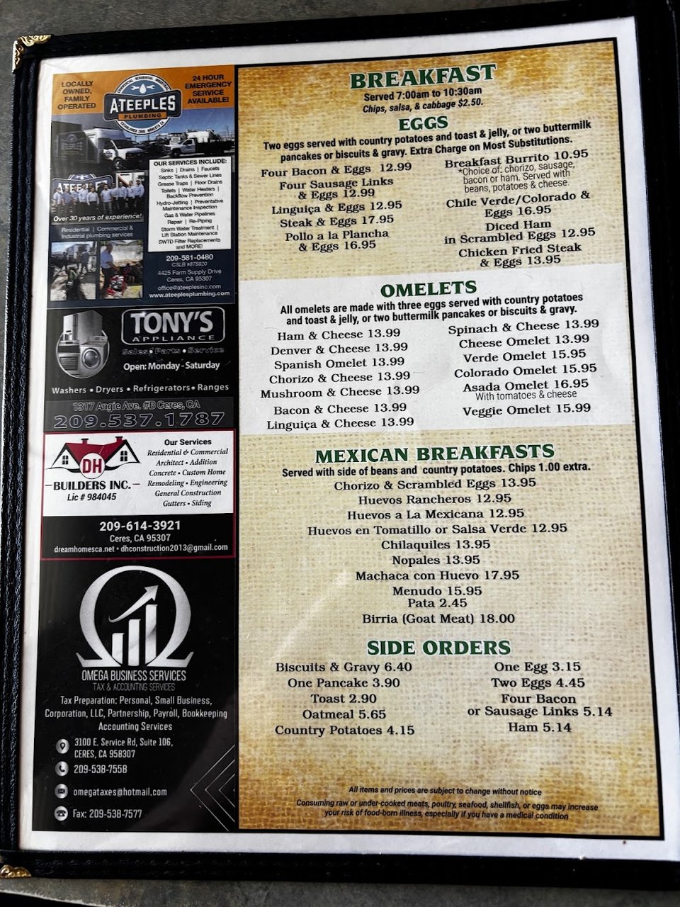 Printed menu with breakfast items listed.